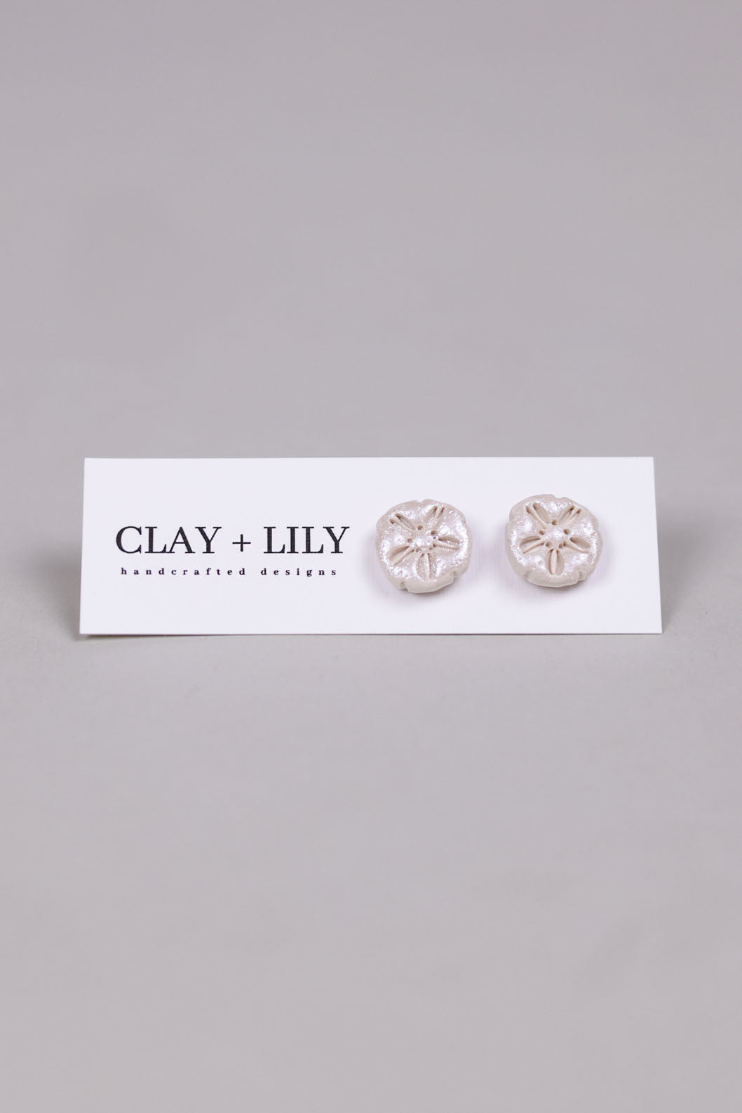 WHITE SAND DOLLAR EARRINGS